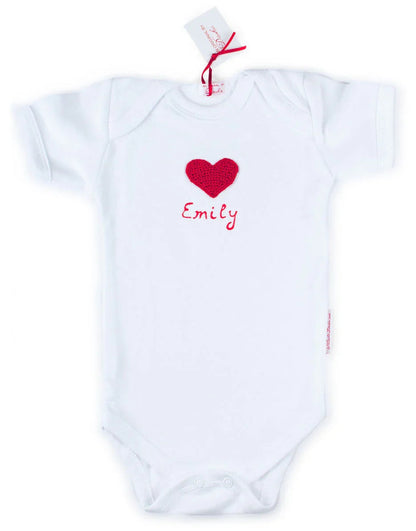White Norvella baby onesie featuring a red crocheted heart and 'Emily' in 3D paint.
