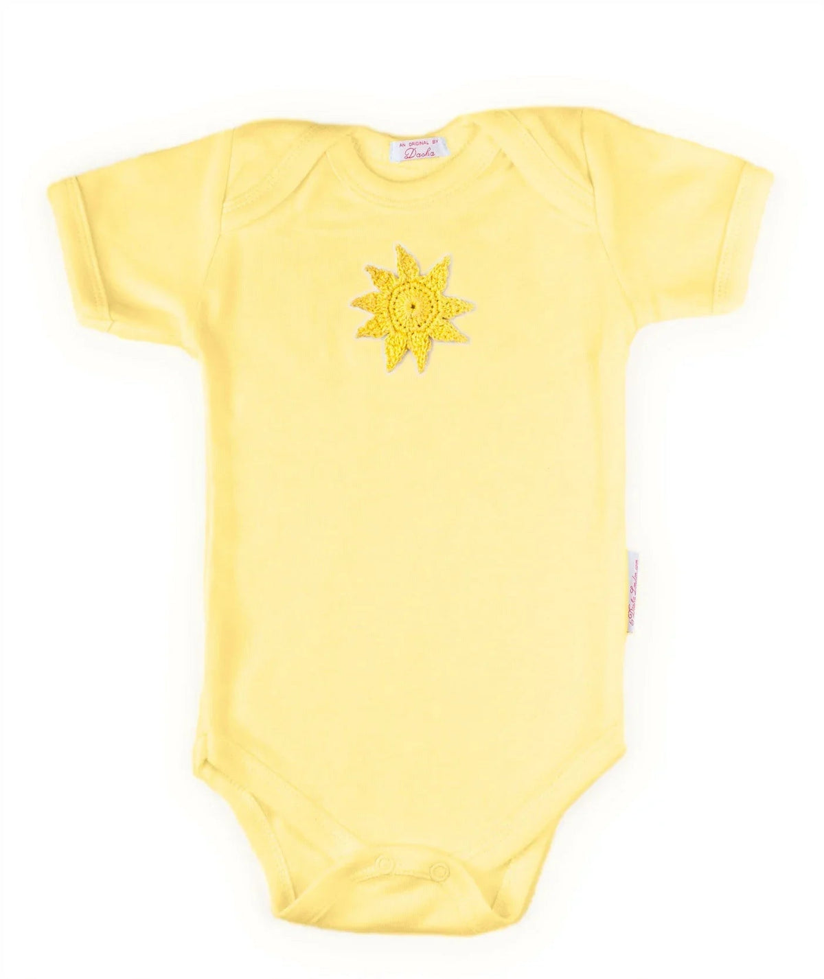 Yellow Norvella baby onesie featuring a hand-crocheted sun design